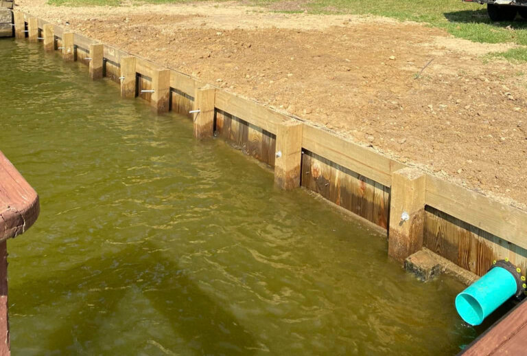 Completed Wood Bulkhead Shoreline New Backfill Lake