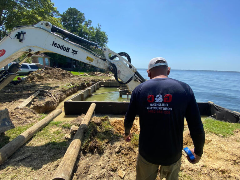 Crew Bulkhead Installation Bobcat Excavator Lake Conroe