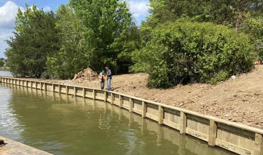 dock construction process Lake Conroe — G&C crew conducting on-site evaluation