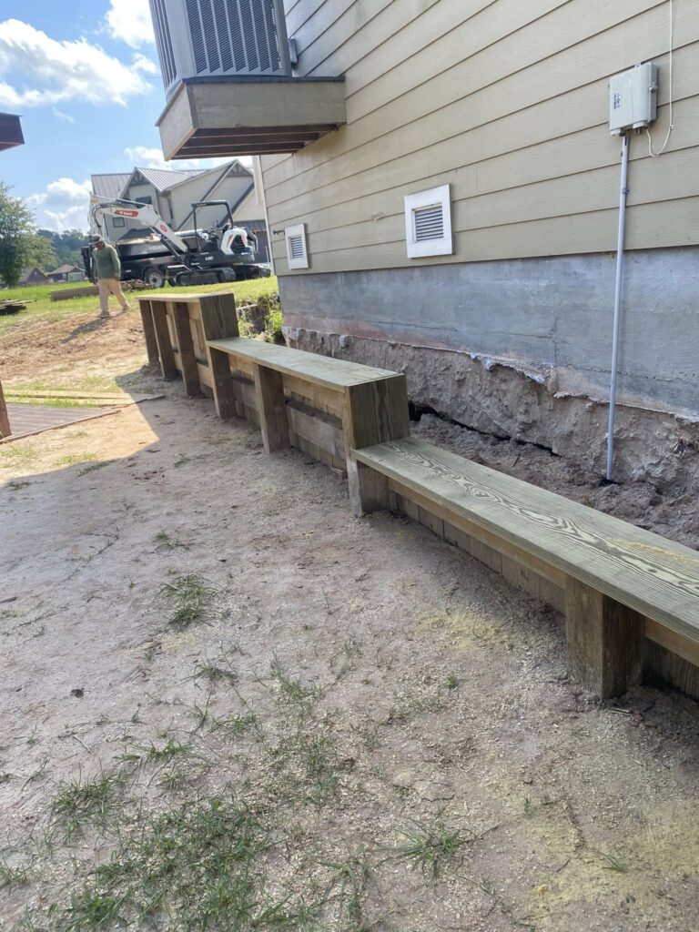 Retaining Wall Framing Under Building Excavator