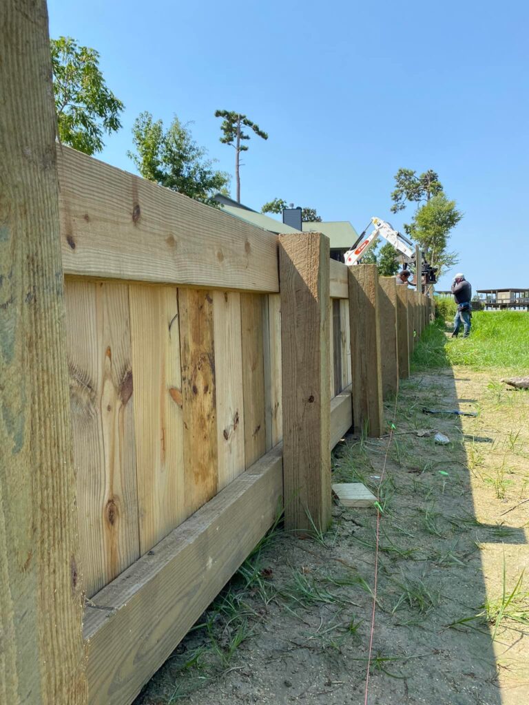 Wood Bulkhead Construction Excavator Shoreline